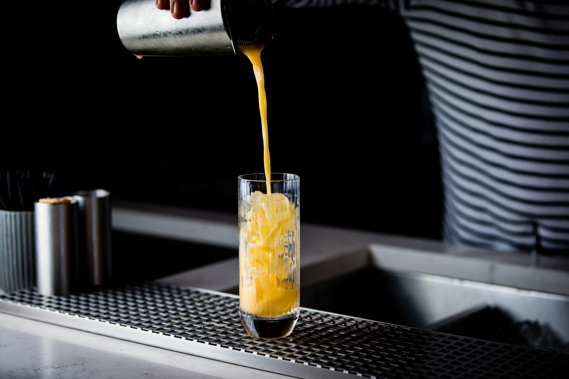 A cocktail poured at the bar